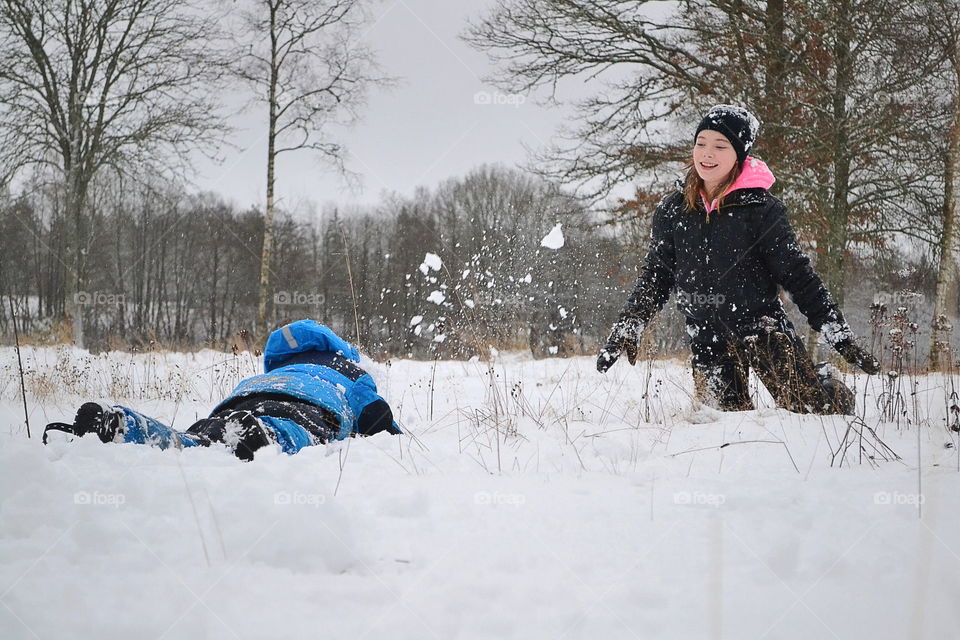 Children having snowball fight