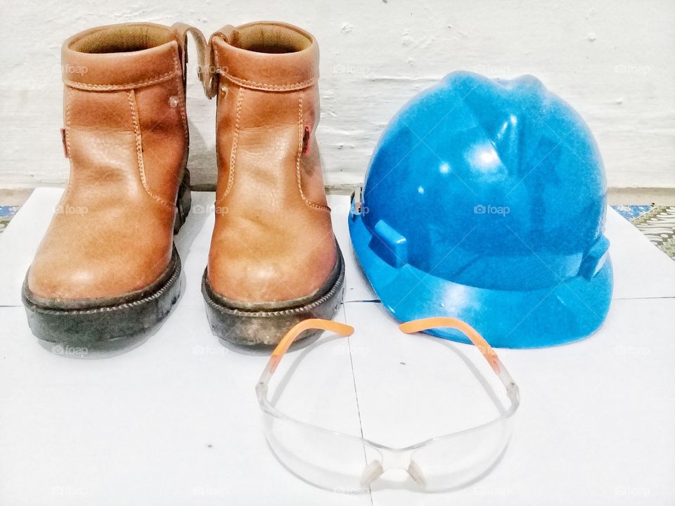 personal protective equipment .helmet,safety shoes,goggles are one of the personal protective equipment for various jobs in the field