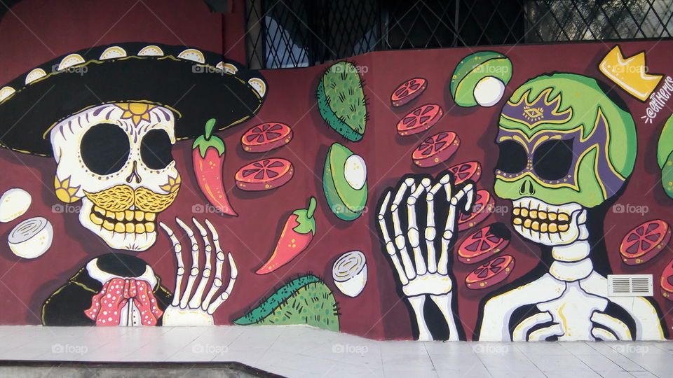Mexican mural of calaveras