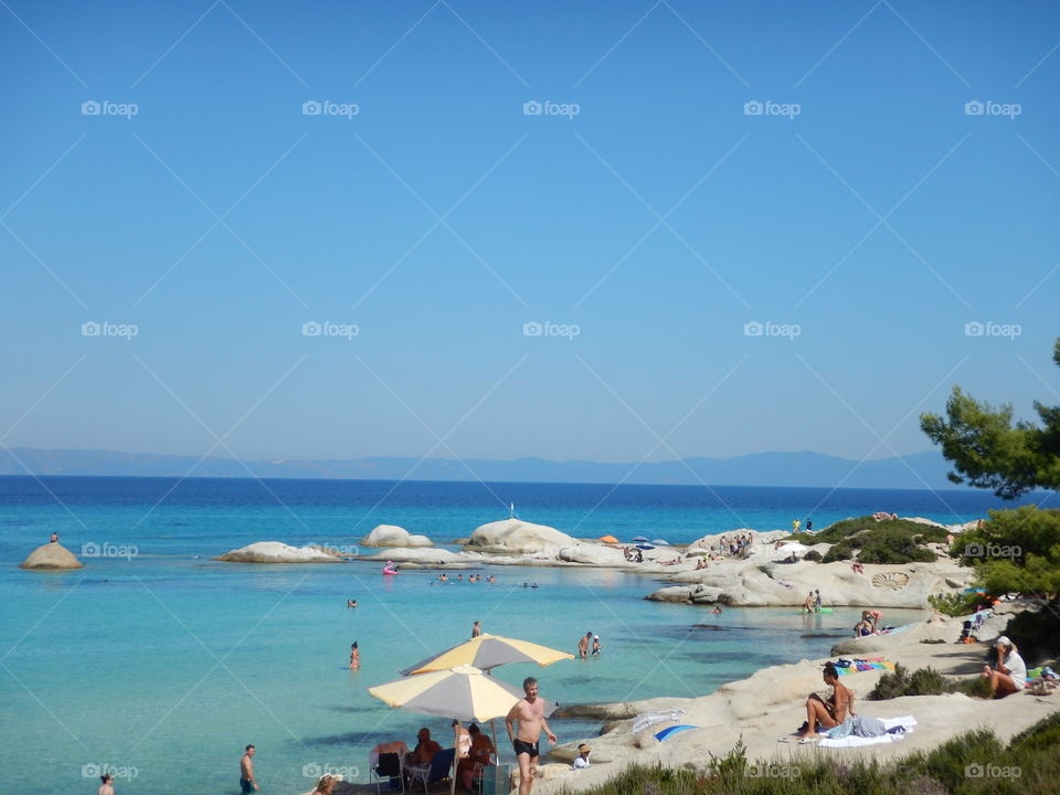 orange beach rocks,sitonia,greece,best beach. clear water