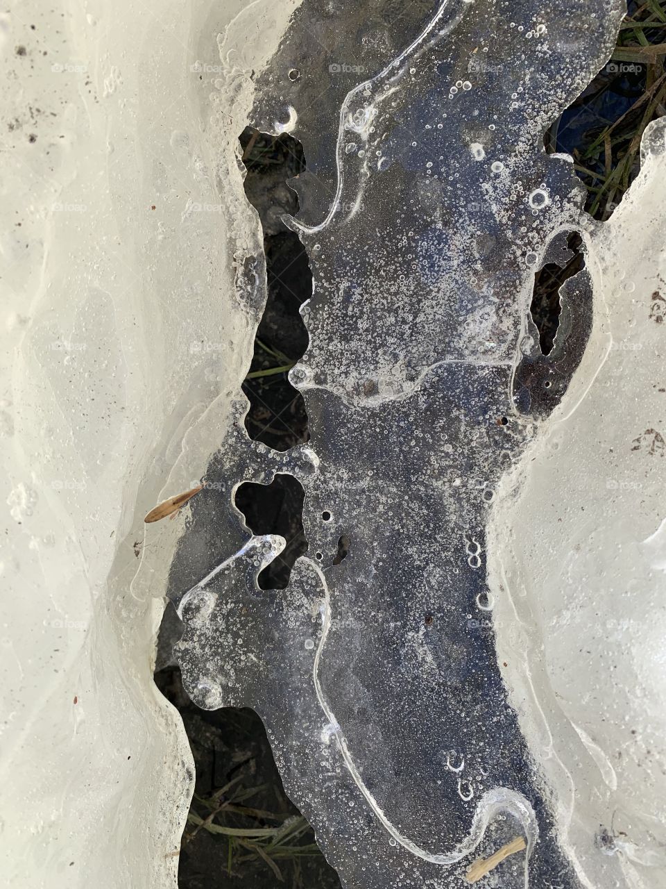 Cracked and Layered ice to ground. 