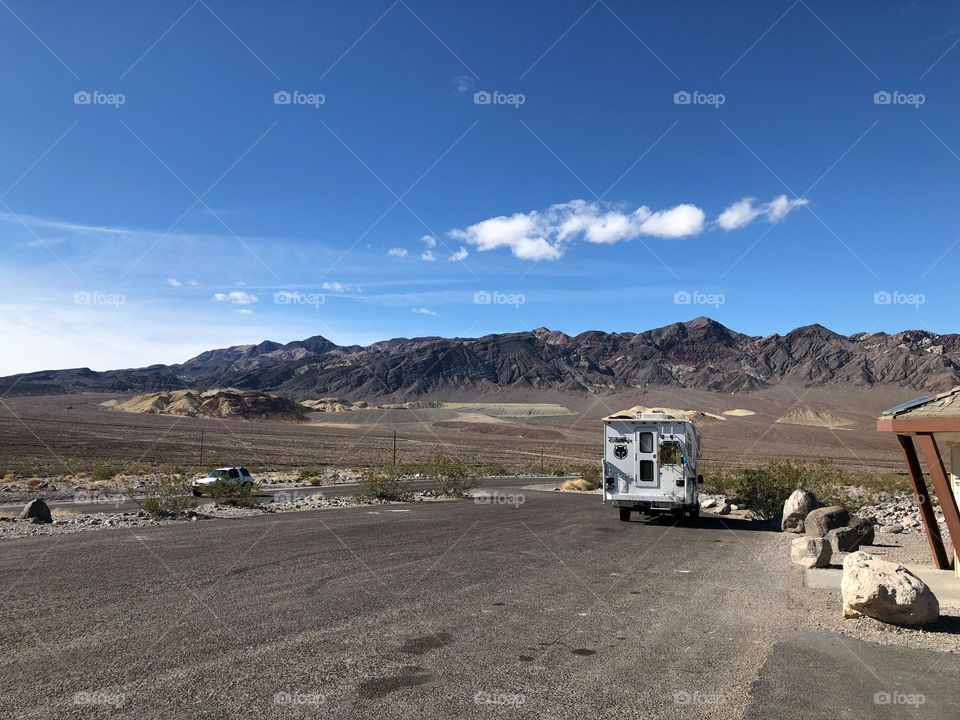 Road trip trailer and the mountain on the desert