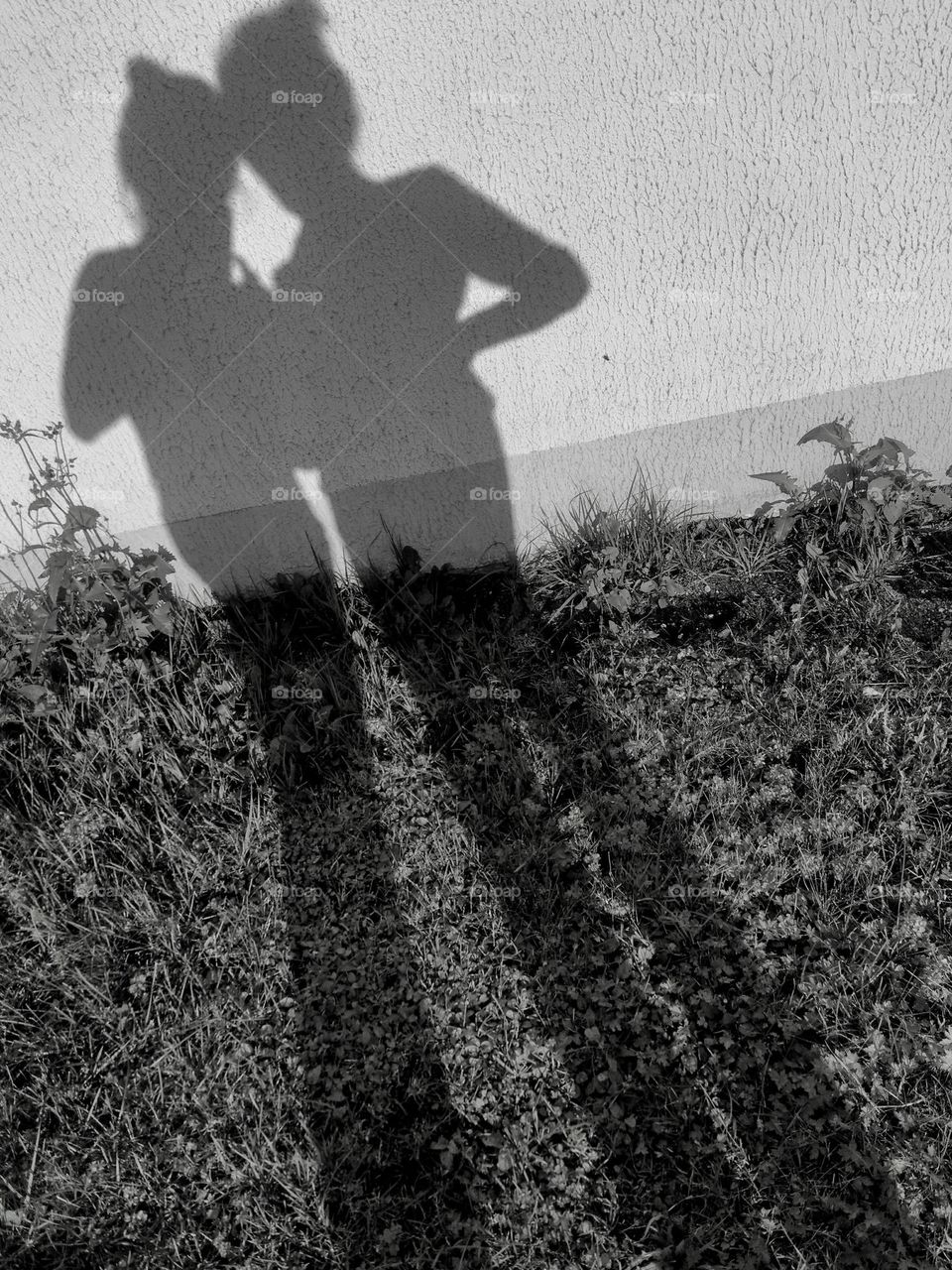 two woman's shadows, female friends , black and white background