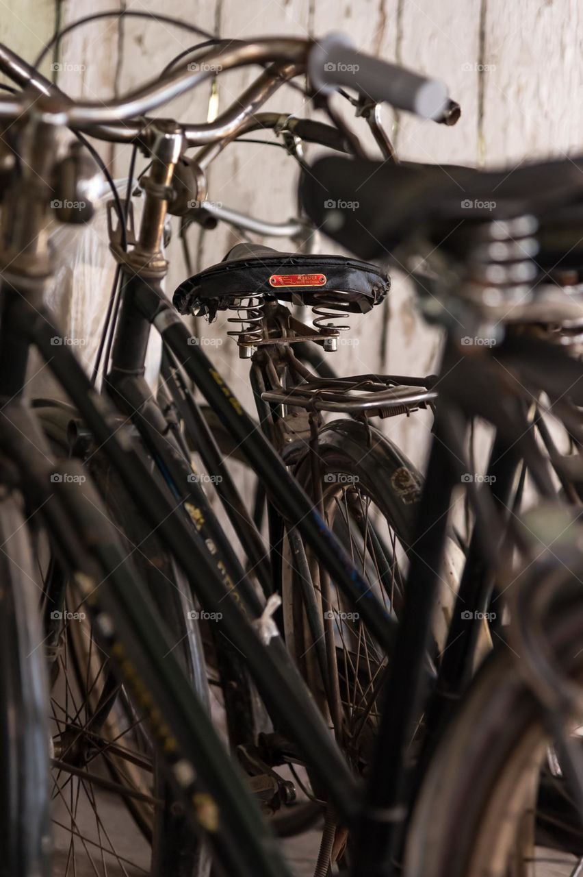 Some old bicycles in a house