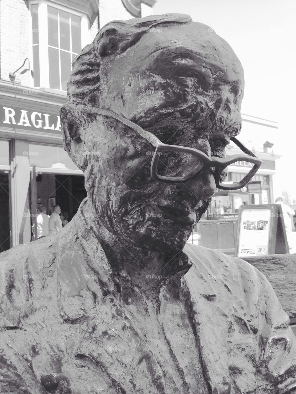 Man on bench black and white