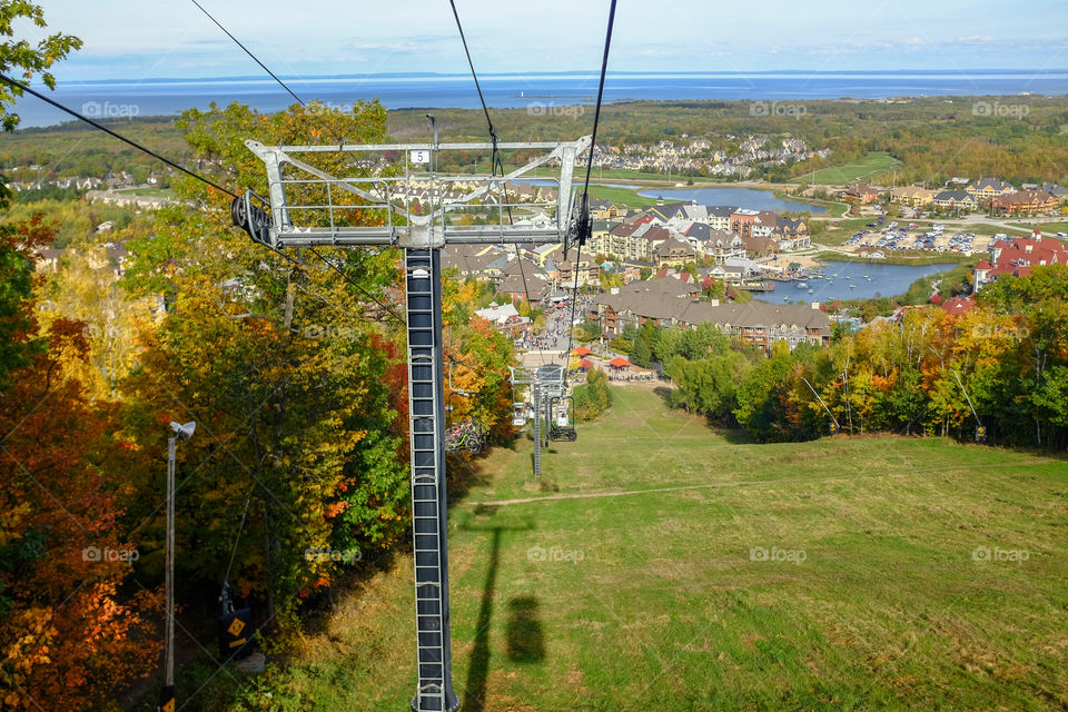 Gondallah ride. High up in the mountains overlooking the trees from a gondala ride