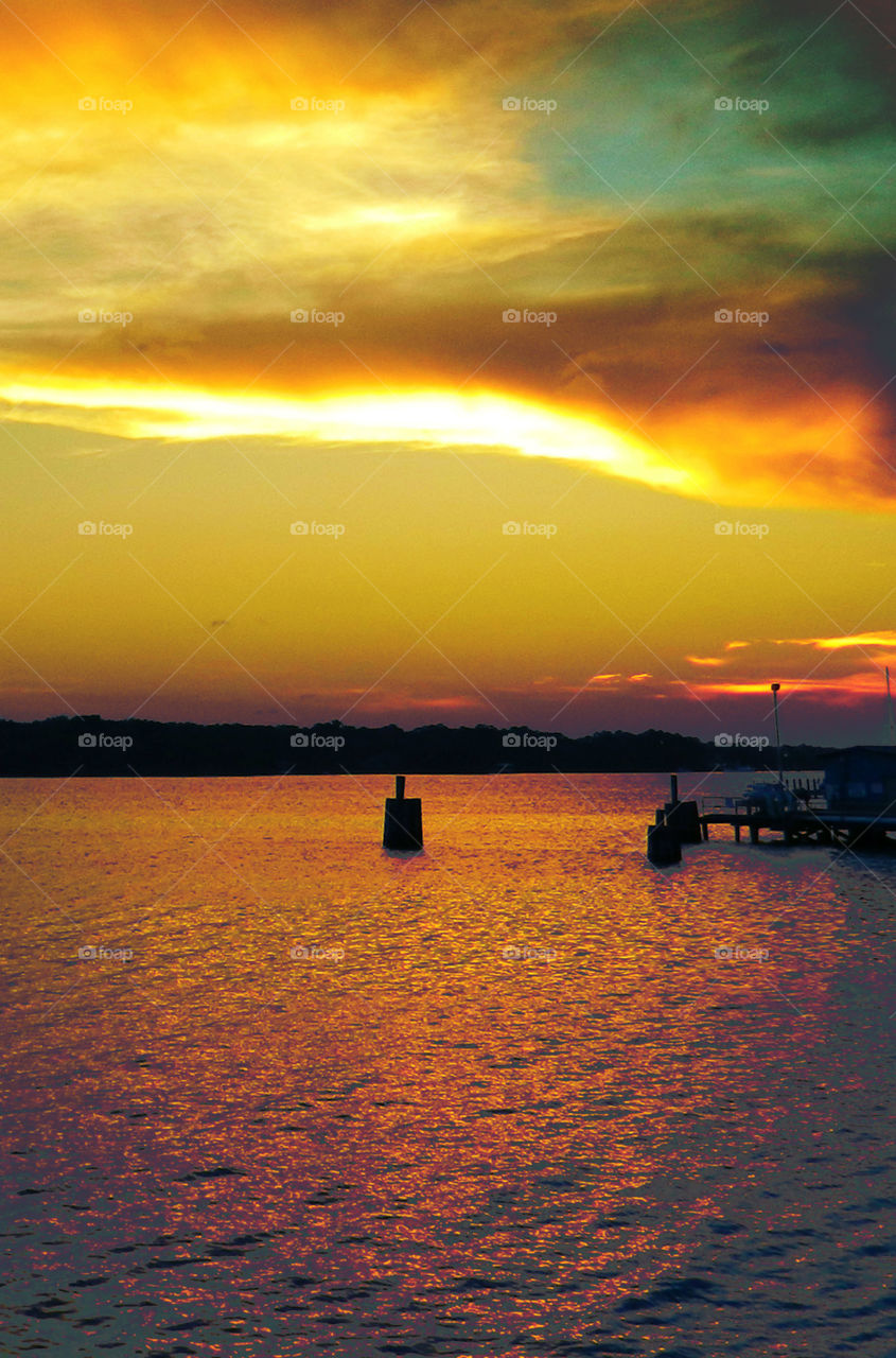 Incredible Sunsets! I am a Sunset enthusiast! The brilliant crimson, amber,tangerine, and blue hues of the sunsets sweep the sky and the surface of the waterways as the beautiful colors embrace the heavenly sky! Breathtaking!