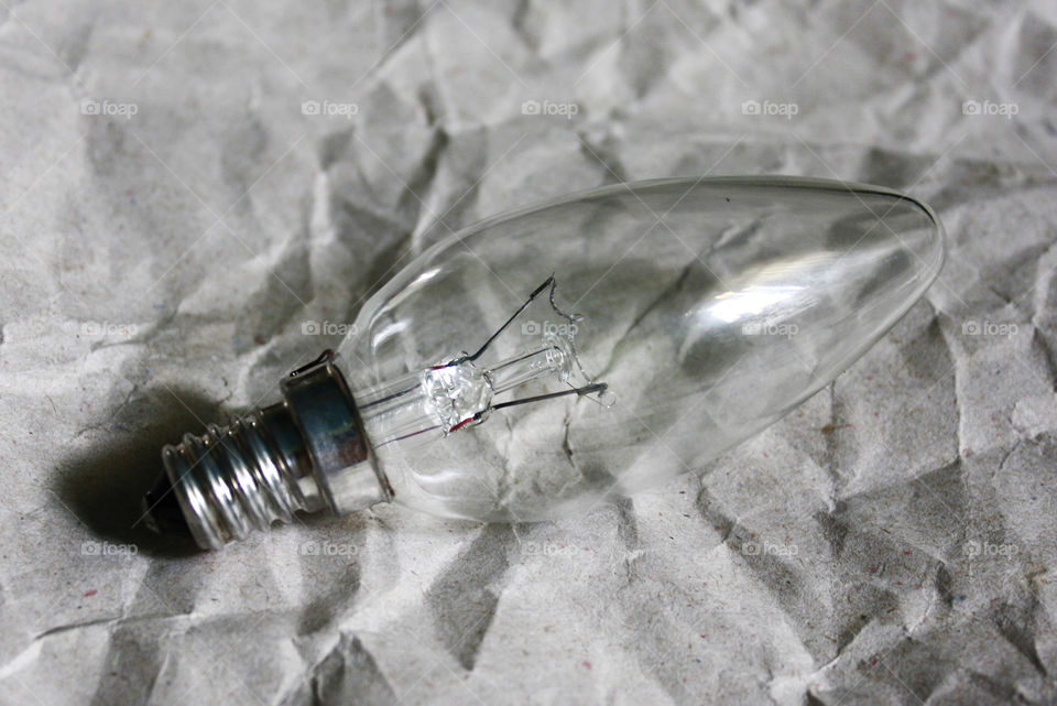 A bulb on a paper background 1