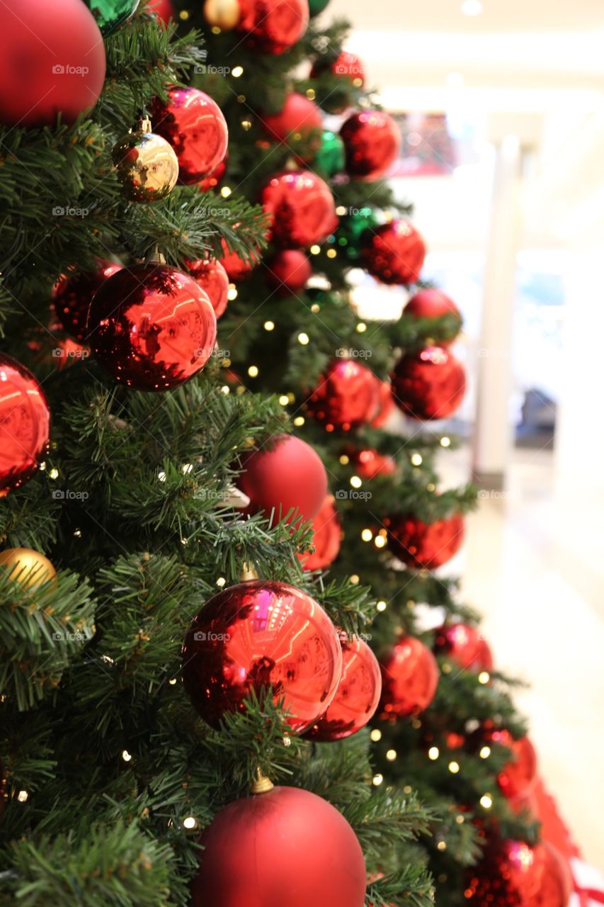 Red decorations in a Christmas tree