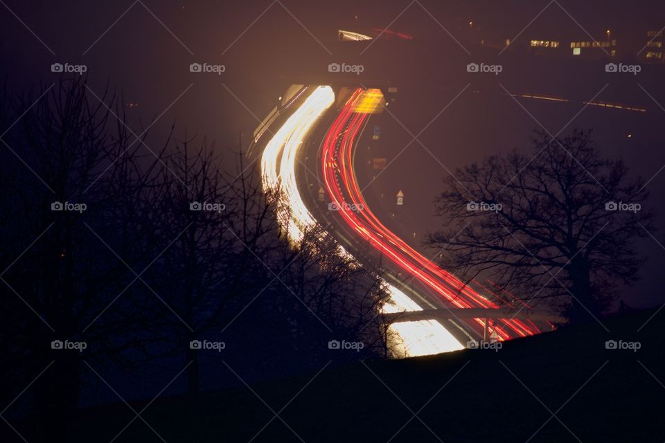 High angle view of light trails at night