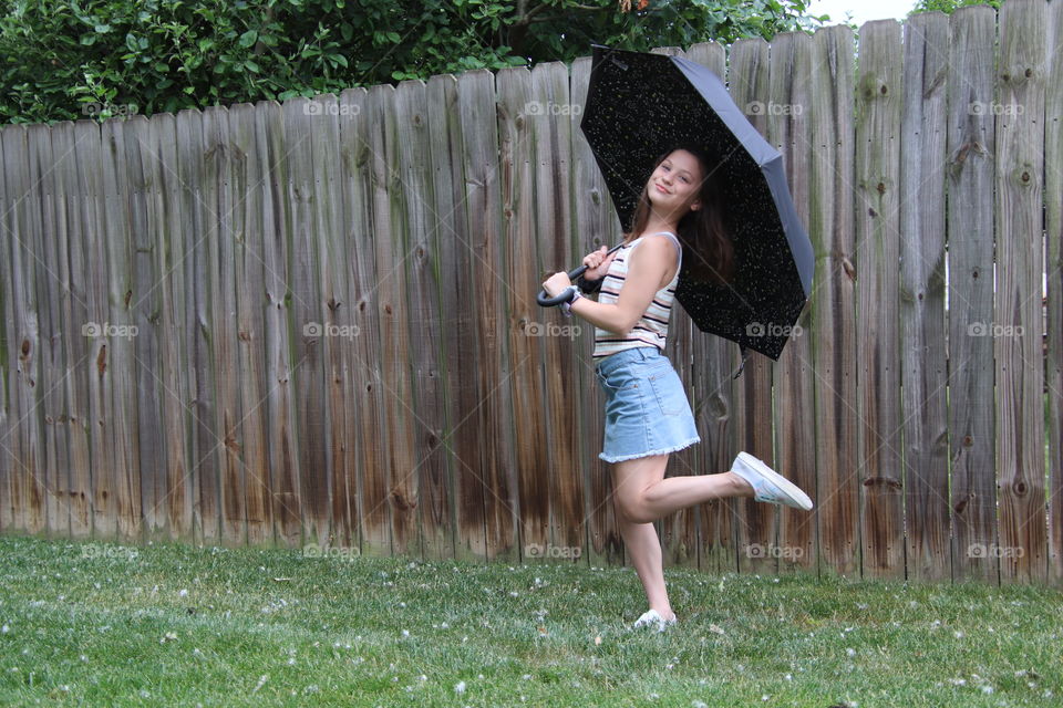 Girl with Totes umbrella