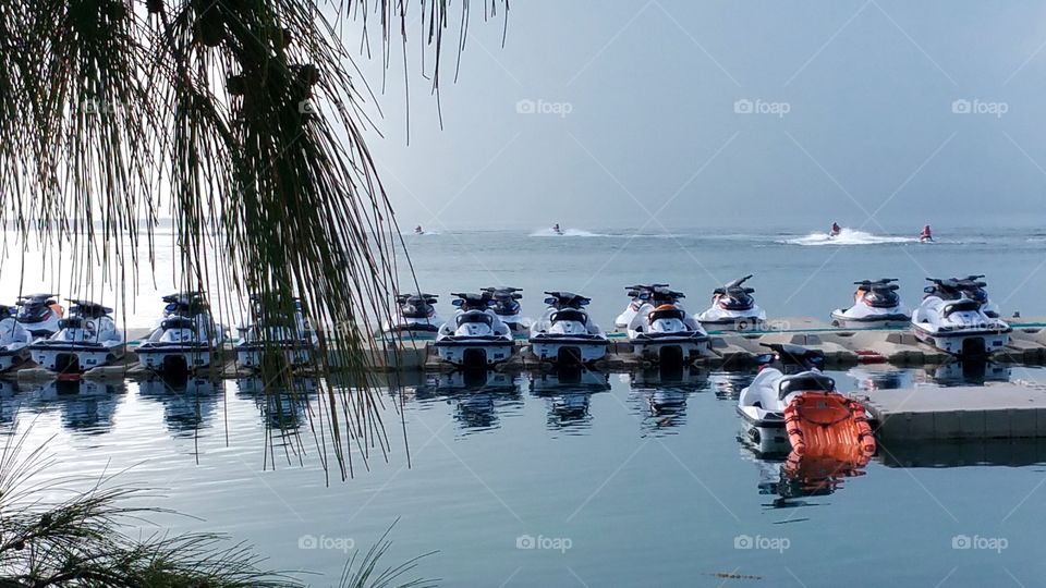 Jet skiers headed back to beat the storm..Coco  Cay Bahamas.. Royal Caribbeans private island
