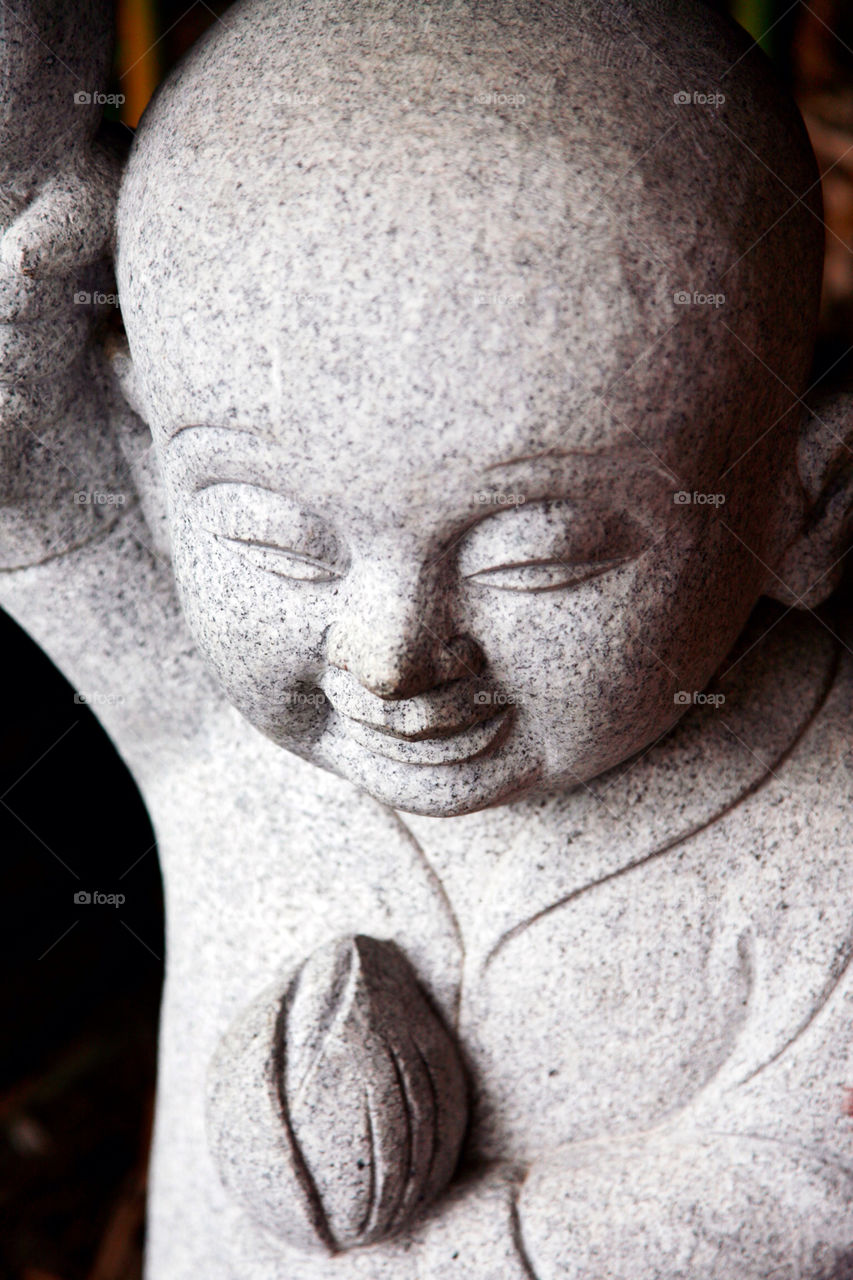 face smile statue stone by king