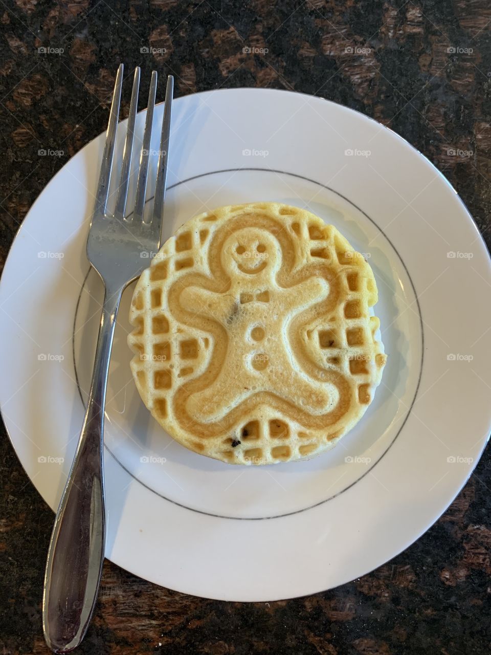 Chocolate chip Waffles - gingerbread man design on a waffle for a holiday breakfast