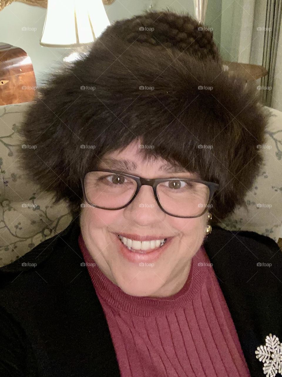 Woman in fur trimmed hat