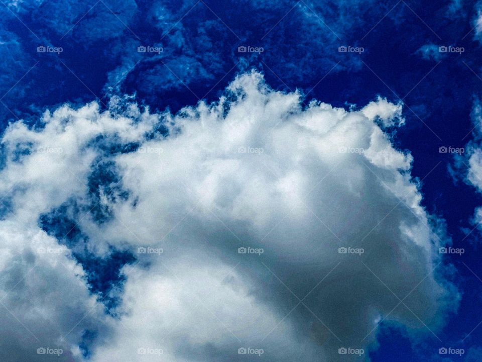 I want to show white clouds and blue sky in this photo.  The sky looks very beautiful with clouds and blue sky.