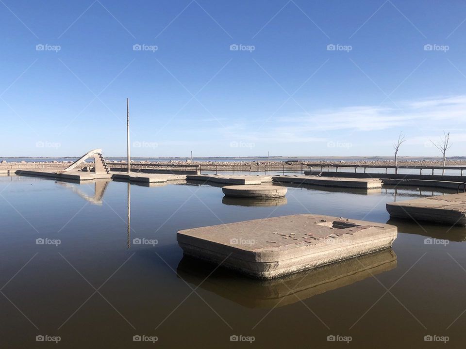 Flooded and abandoned swimming pool 