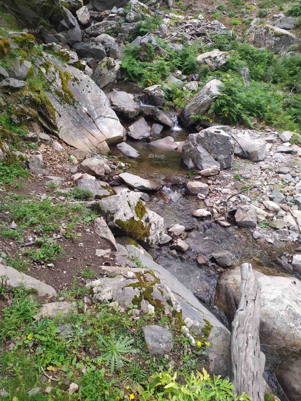 stream with cold water in village at Crete