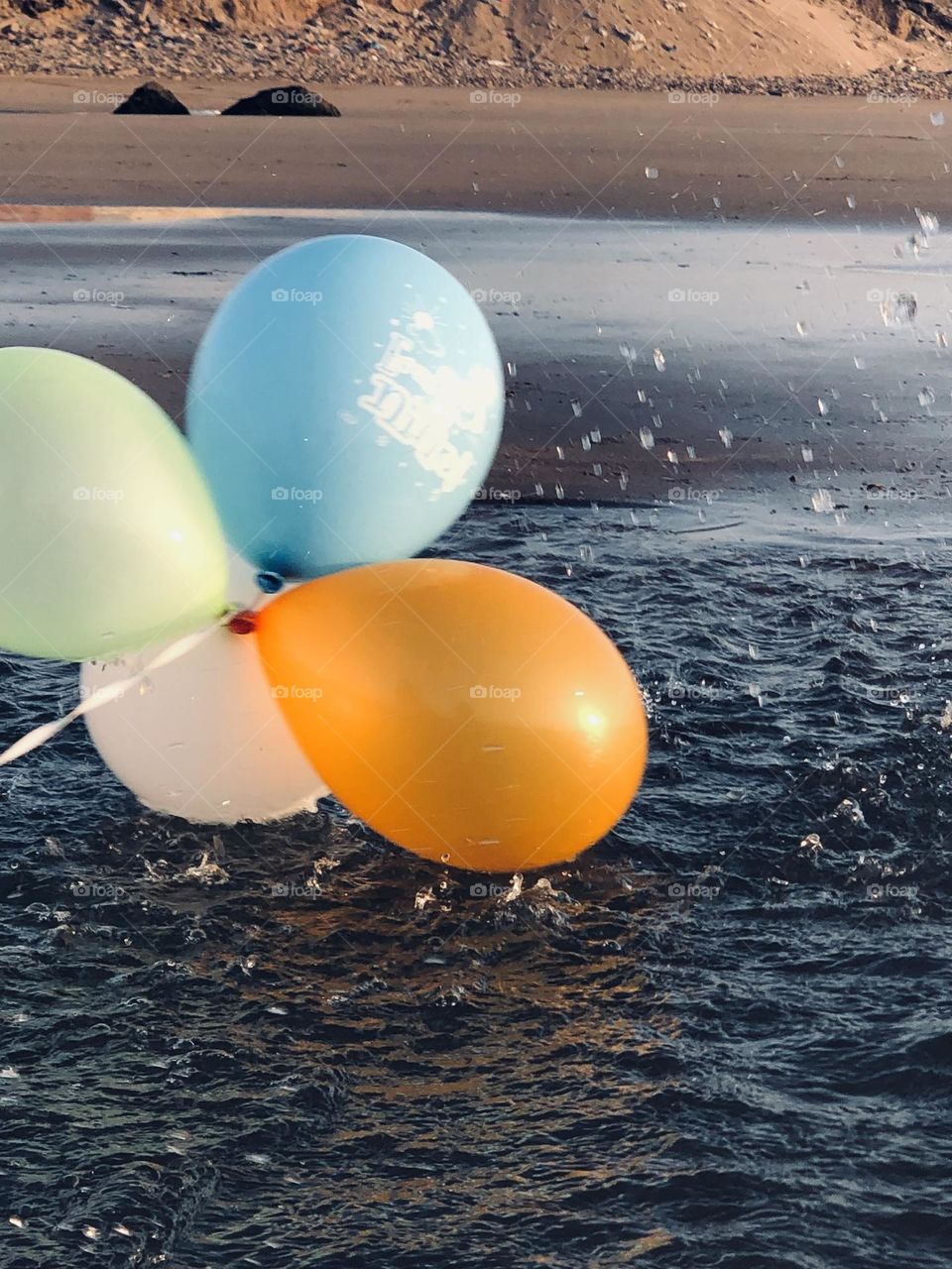 Beautiful and multicolour balloons in the water