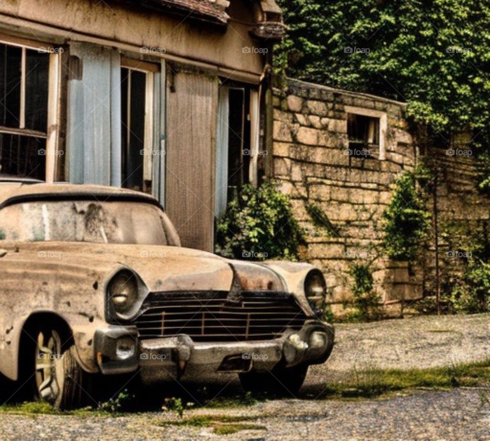 old car and old house