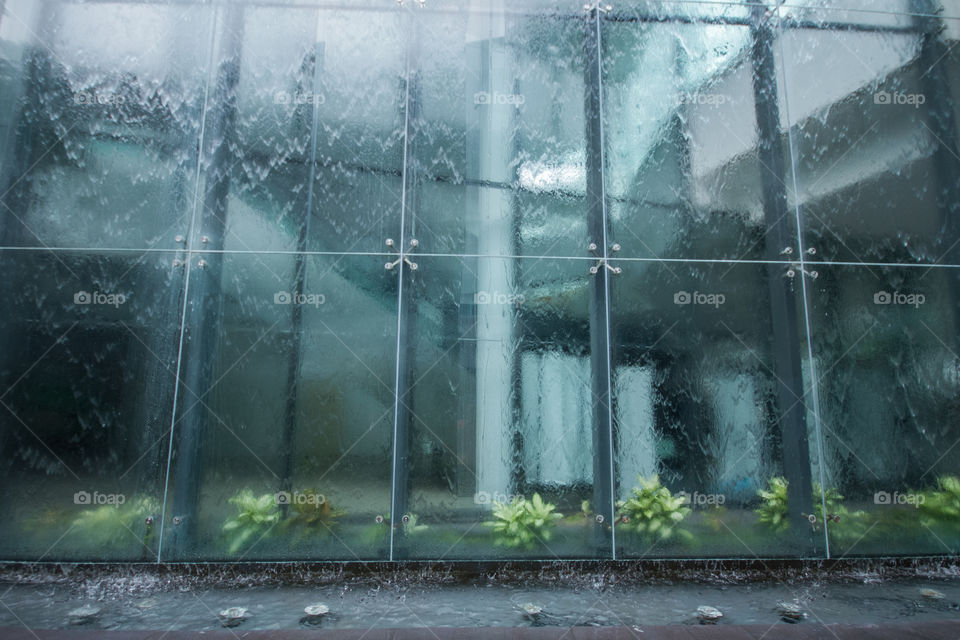 Wet glass of building in rain