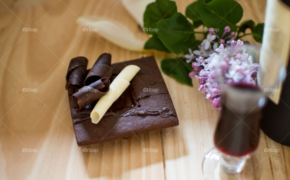 Dark chocolate cookie and vintage port wine pairing focus on chocolate conceptual gourmet food experiences epicure vintner background photography
