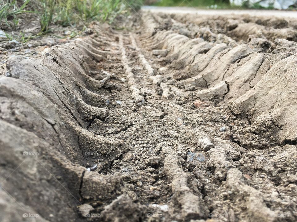 Wheel track on dry soil texture