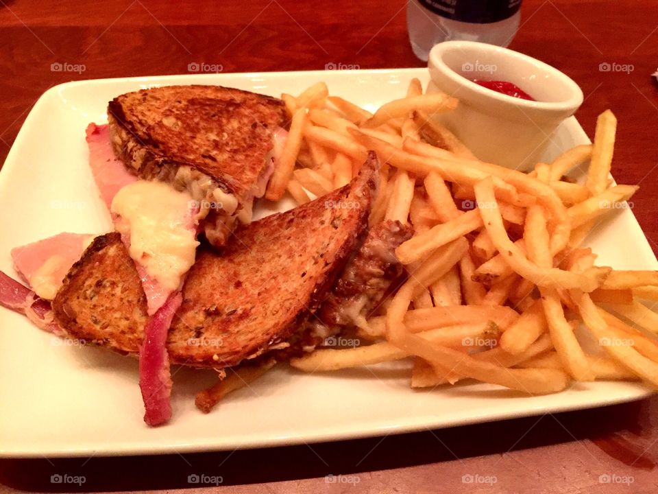 Grilled ham and cheese with French fries 