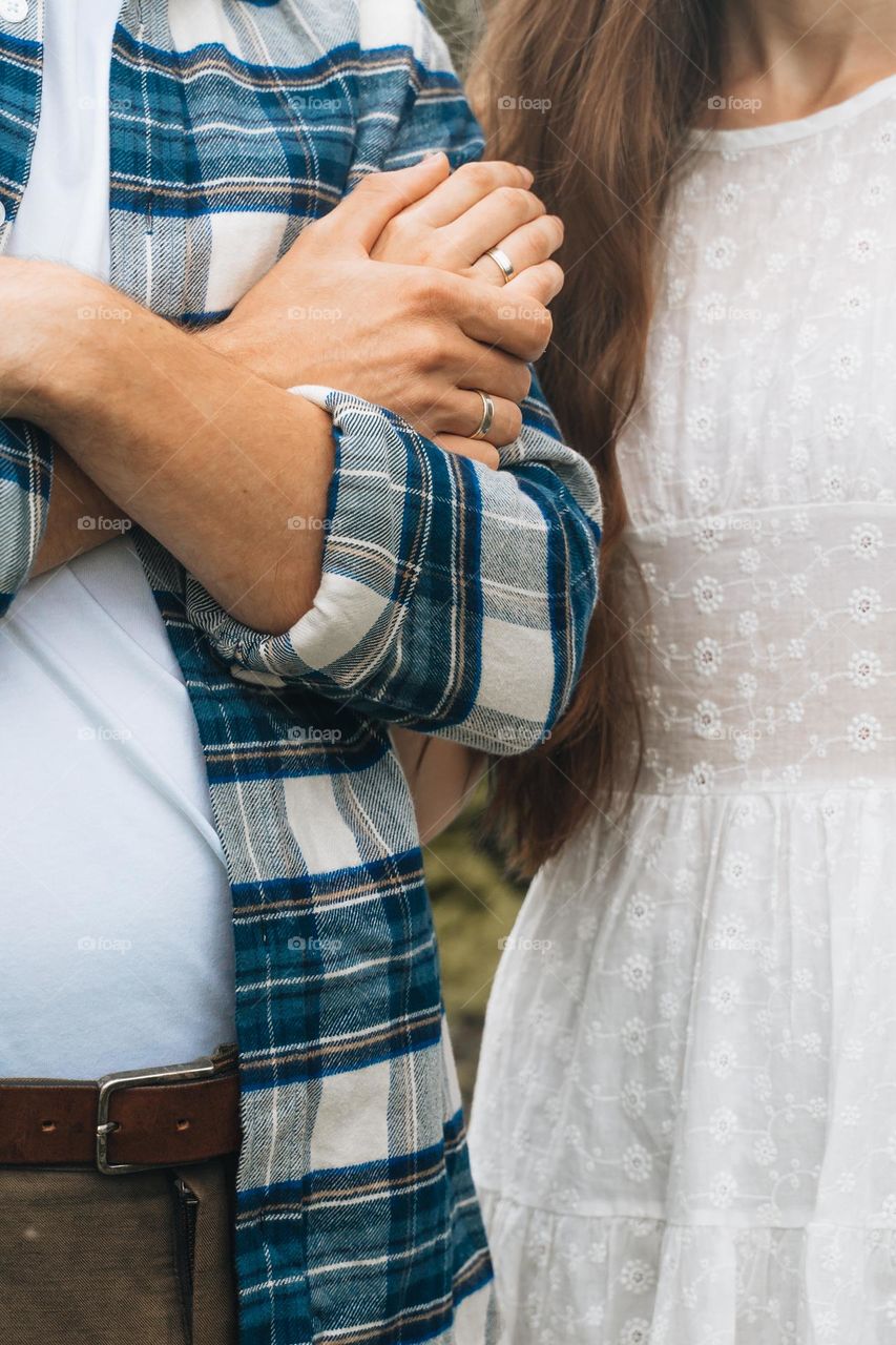 Rings on couple hands 