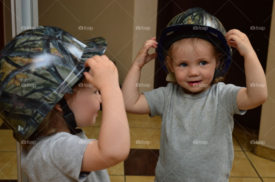 Child in a unique helmet