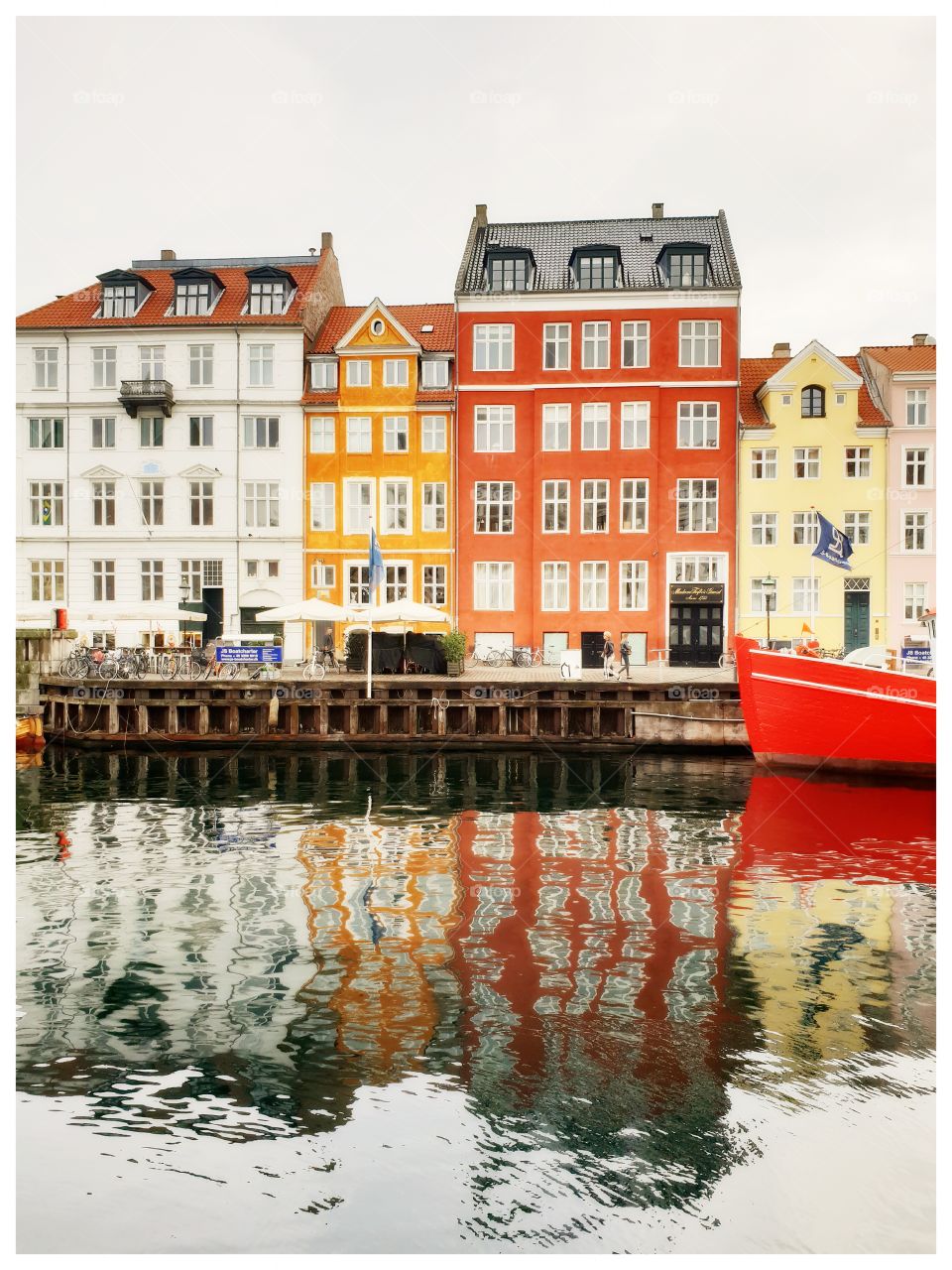 Nyhavn in Kopenhagen was beautiful to me. The colors and reflection in the water was mesmerising!