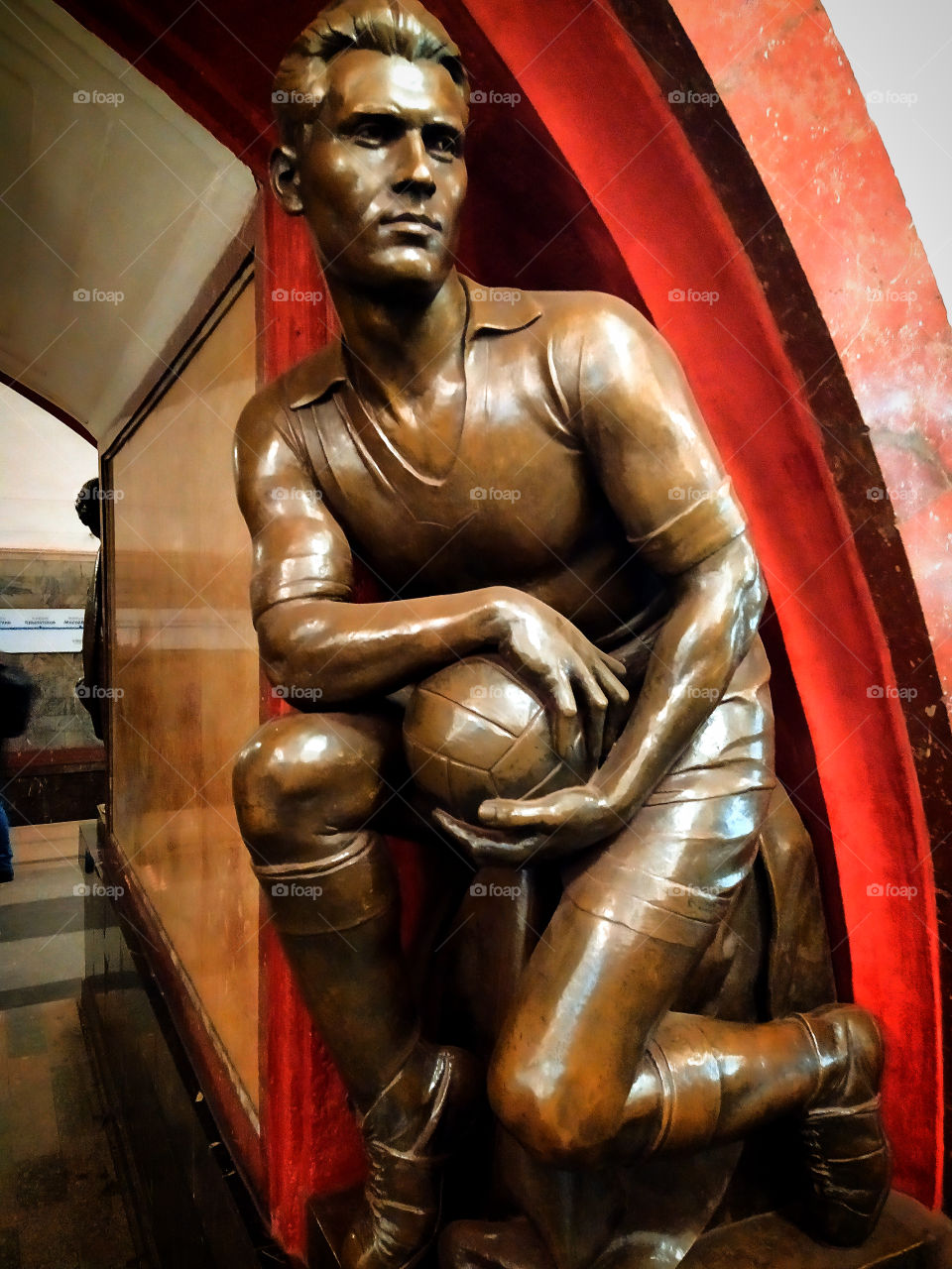 Moscow subway.  "Revolution square".  Man and ball