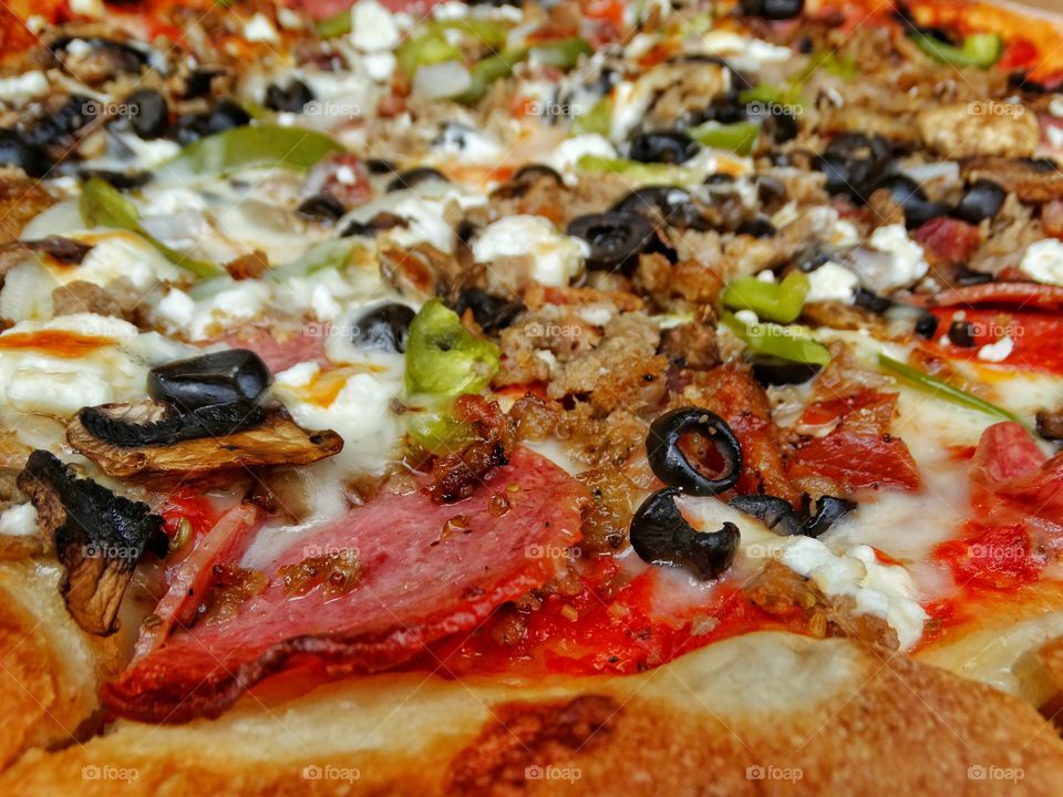 Pizza With Colorful Meat And Veggie Toppings