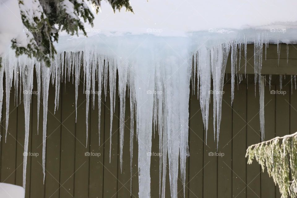 Icicles on a rooftop 