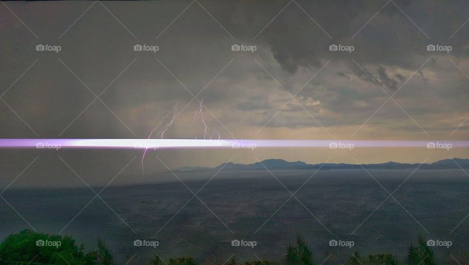 lightening on the horizon . Greece, corfu,  caught on my htc