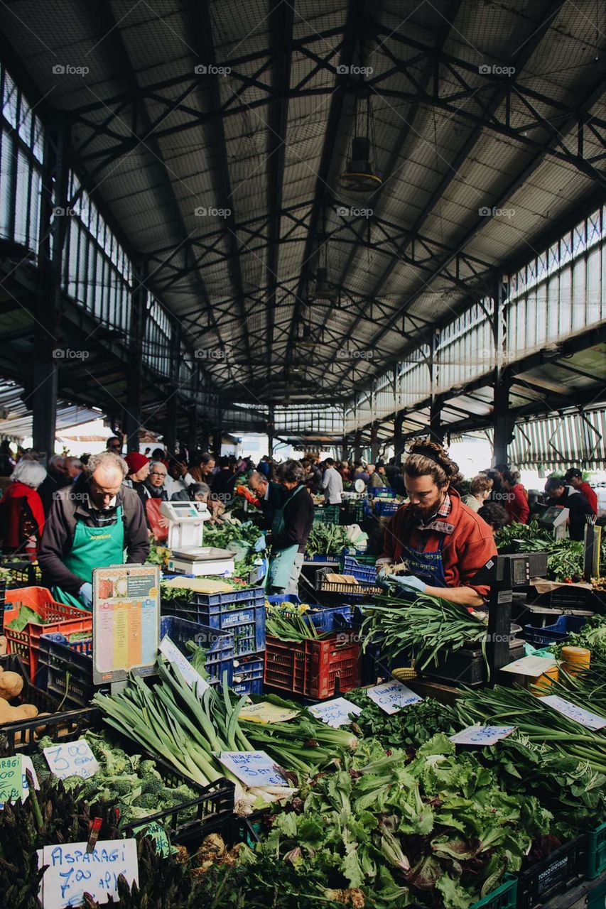 man sitting near the vegetable
