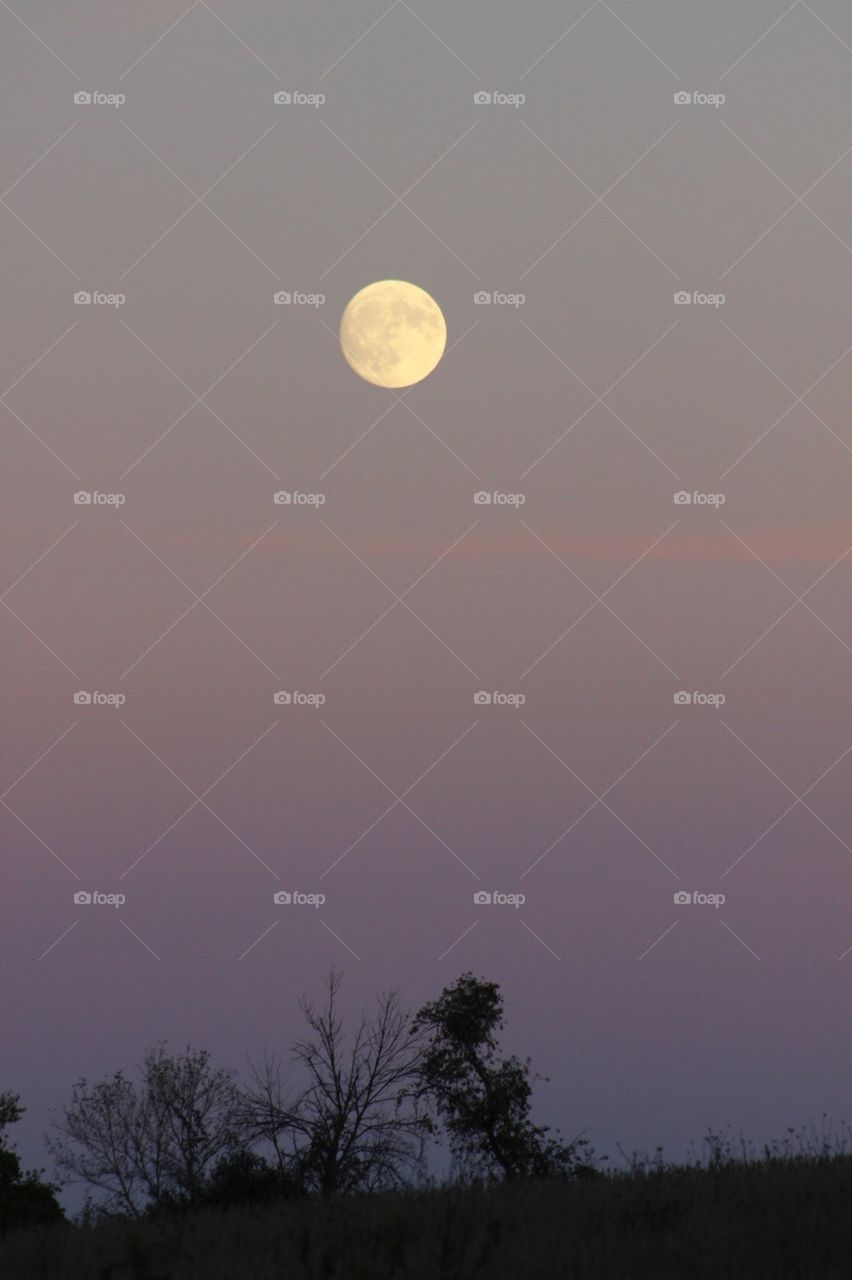 Moon during a sunset