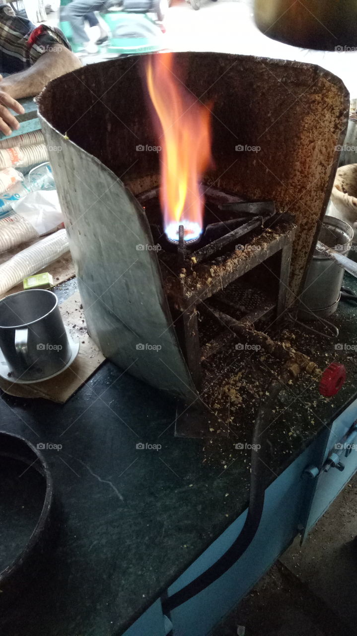 Making of tea under flame