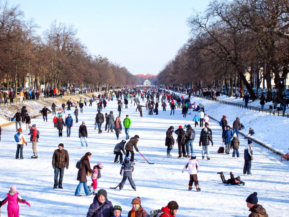 Hockey and ice skating on a frozen canal 