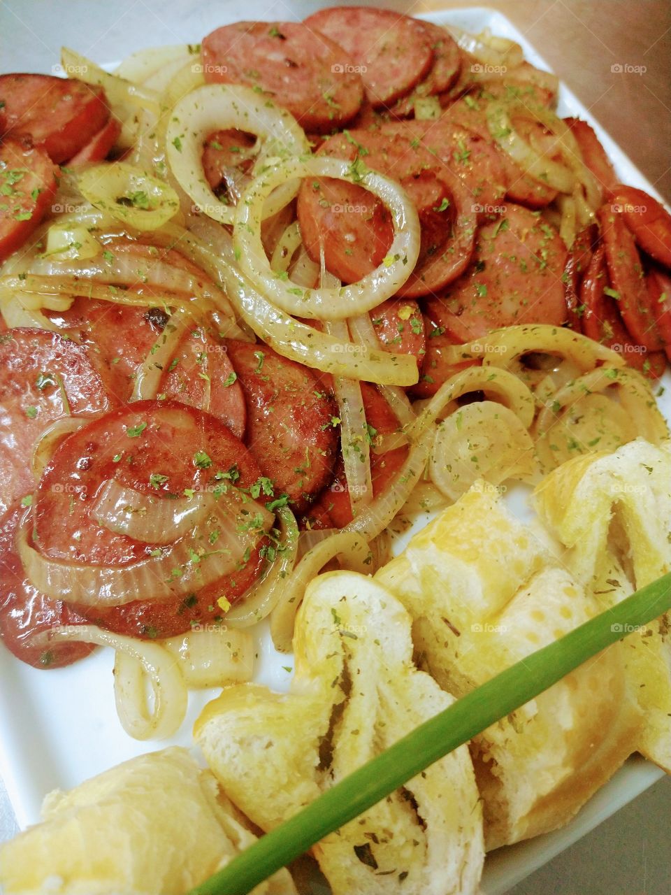 Calabresa acebolada.