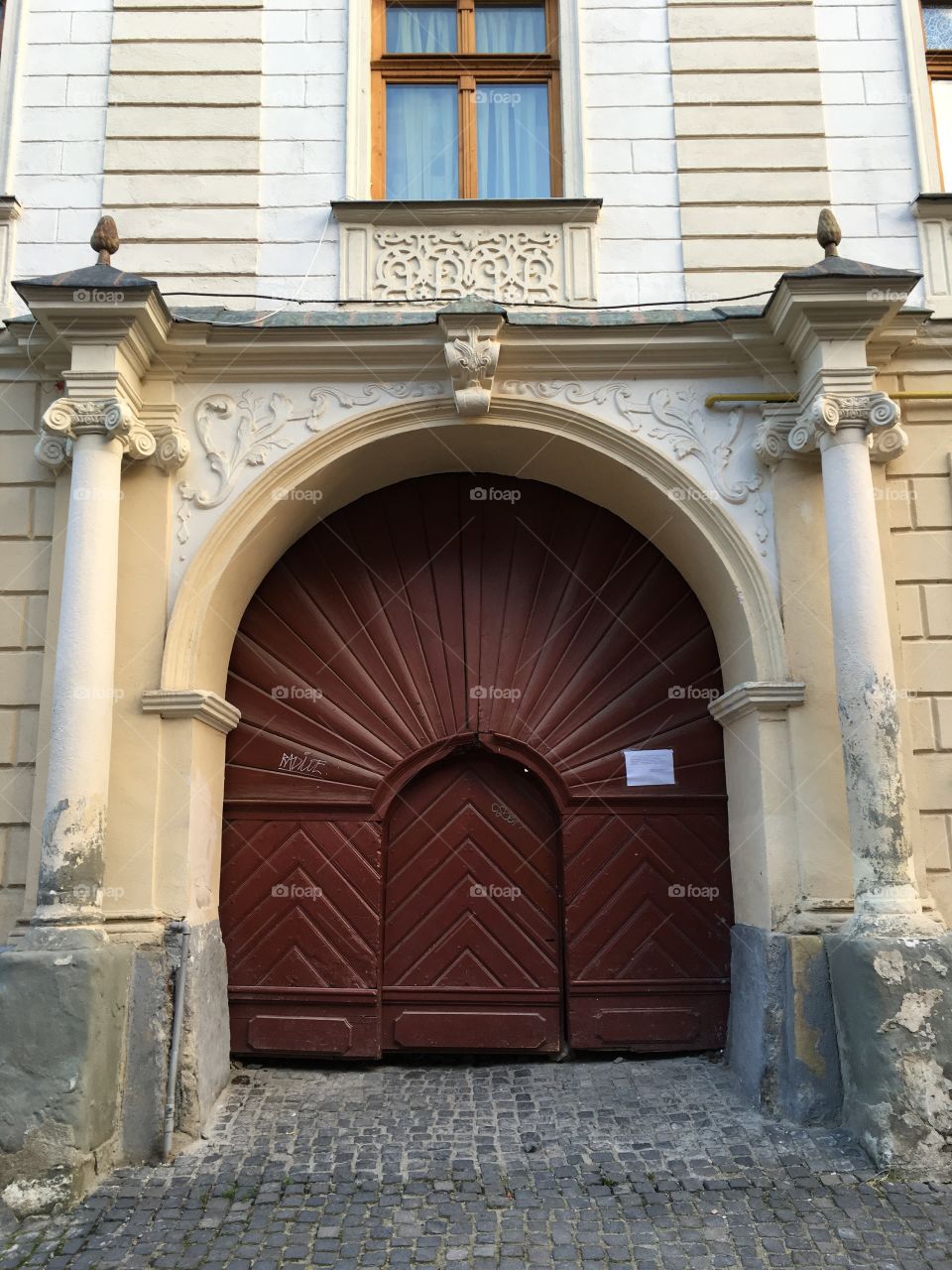 Main entrance of historical building, Brasov, Romania