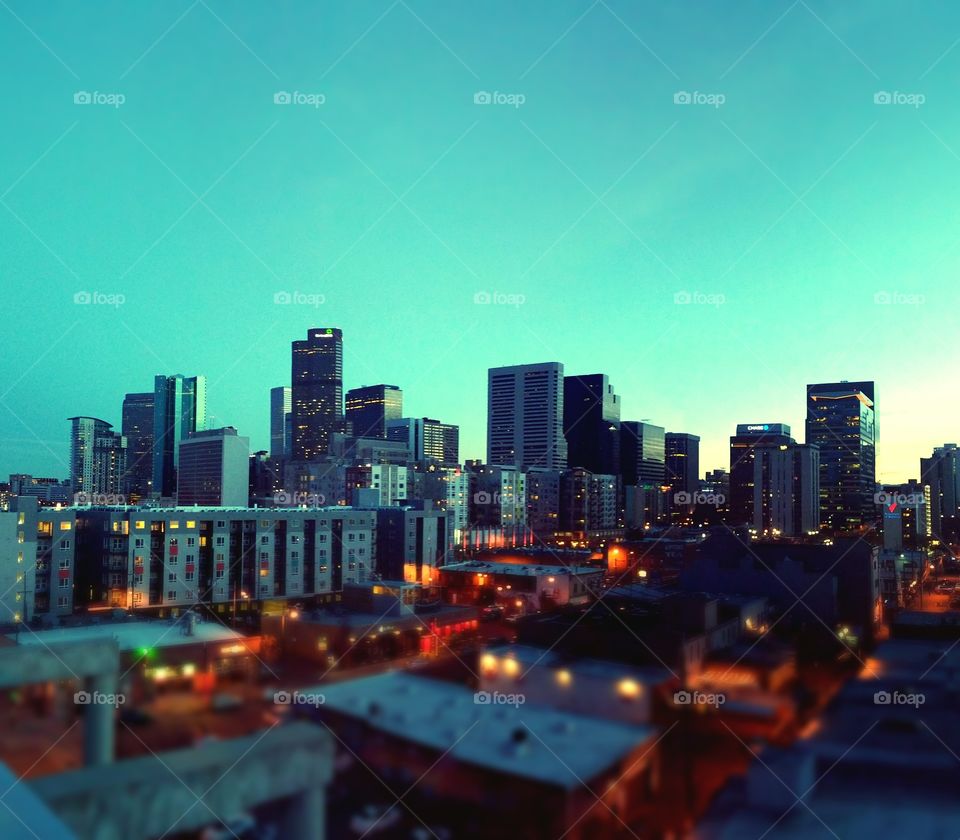 Cityscape. Golden hour on top of a building in Denver, Colorado.