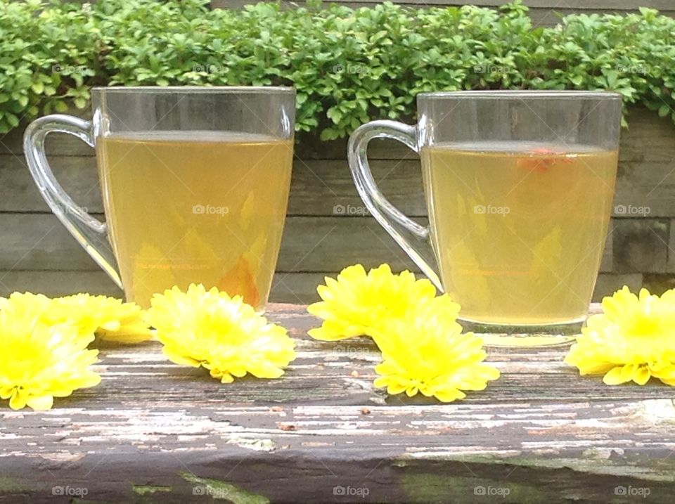 Enjoying a hot cup of tea outdoors in the Spring.