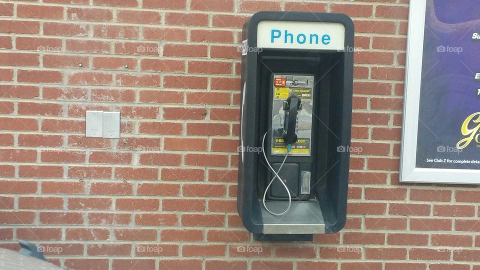 Rare siting of a pay phone
Brick wall, outdoors