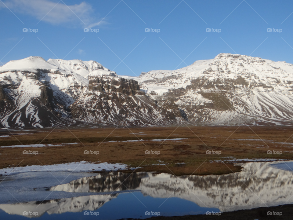 Iceland  reflections . Reflections of mountsins in water pools iceland