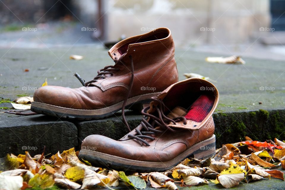 Boots and autumnal background 
