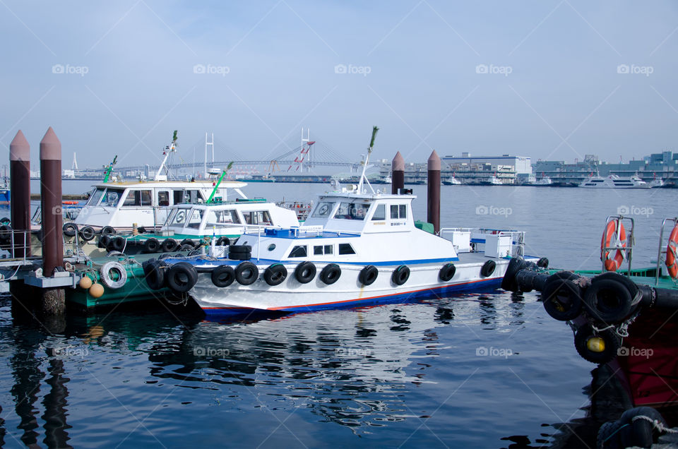 ocean sky white boats by hugo