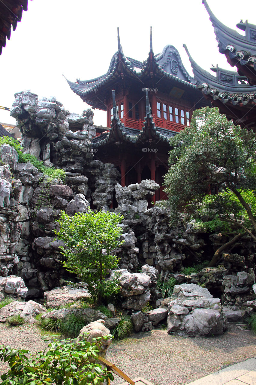 House between the rocks. A traditional house between rocks in Yuyuan garden, Shanghai, China.