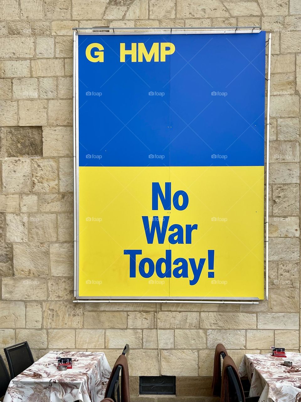 Poster on yellow and blue with instruction No war today!