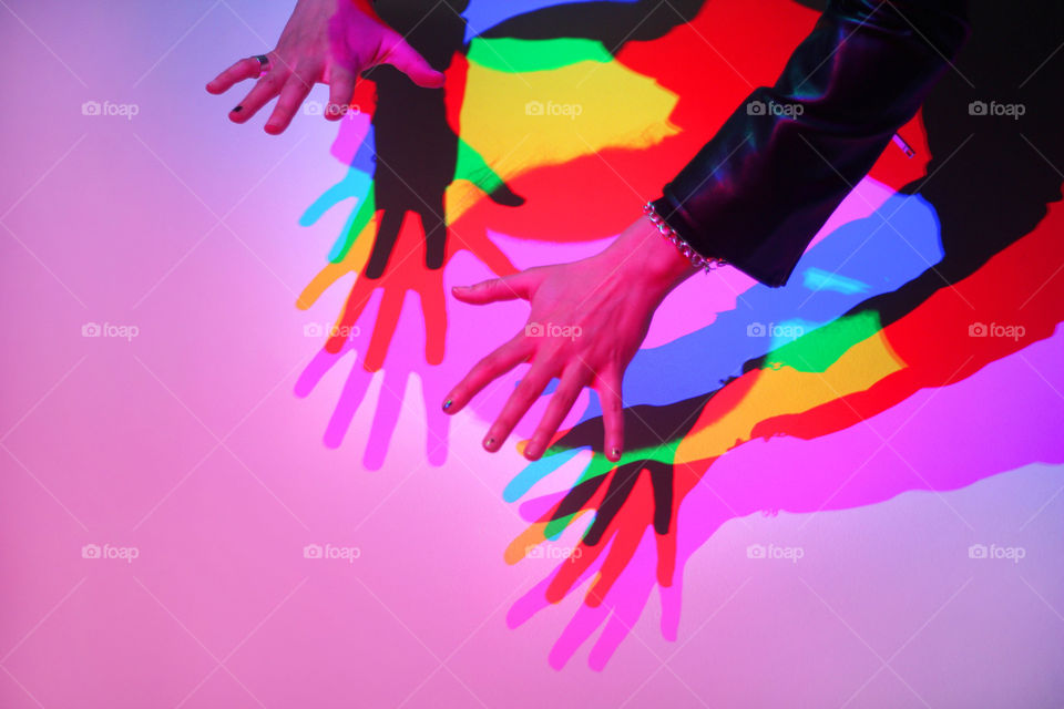 Hands colorful shadows